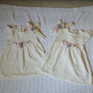 Cream knit dresses for twin girls